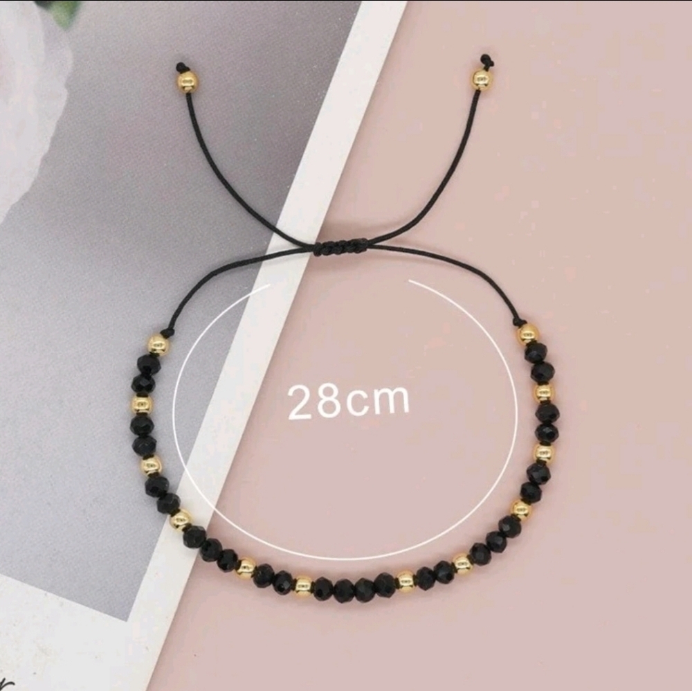 Elegant Adjustableβ Black and Gold Beaded Bracelet For Women And Men